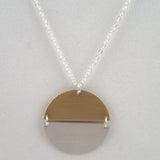 Hemisphere Necklace in silver and brass