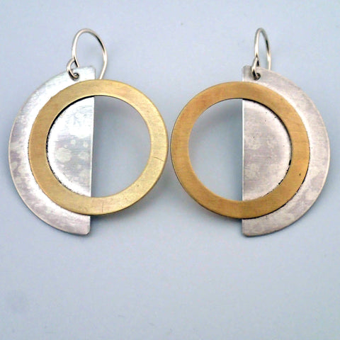 Eclipse earrings in silver and brass