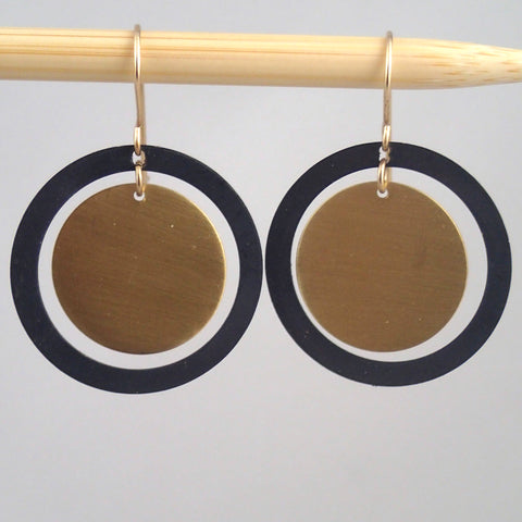 Brass and oxidized "saturn" circle earrings